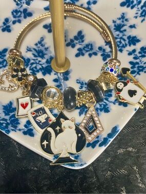 Gold Tone Cat Charm Bracelet with Black and White Enamel Accents